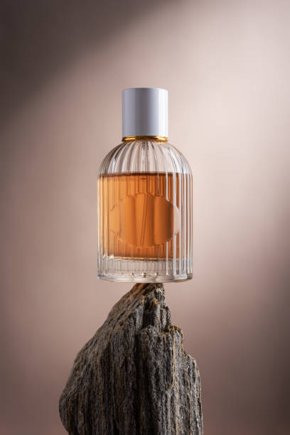 istock Glass parfume bottle standing on a stone 1781459209