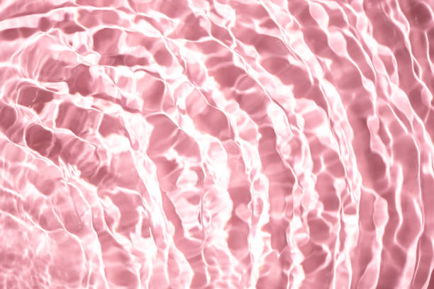 istock Beautiful water texture with waves. pink color, water background 1781465509