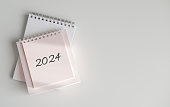 Top view of calendar 2024 on white background