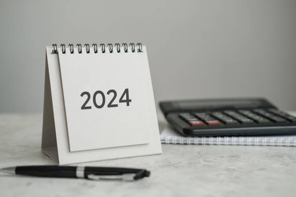 istock Desk calendar 2024, calculator and pen on the table 1781467253