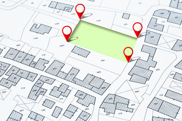 istock Land management concept with an imaginary cadastral map of territory and vacant land available for sale or building construction inside a city 1781475885