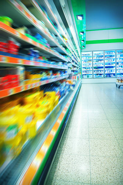 istock Motion blurred colorful aisle from grocery store 178147728