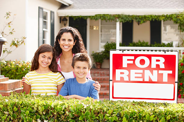istock Mother and children outside home for rent 178147988