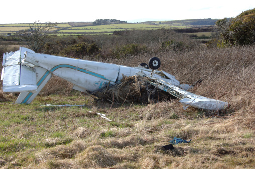 Crashed Light Aircraft in a field upside Down.