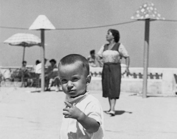 istock Child at the beach. 1959. 1781501428