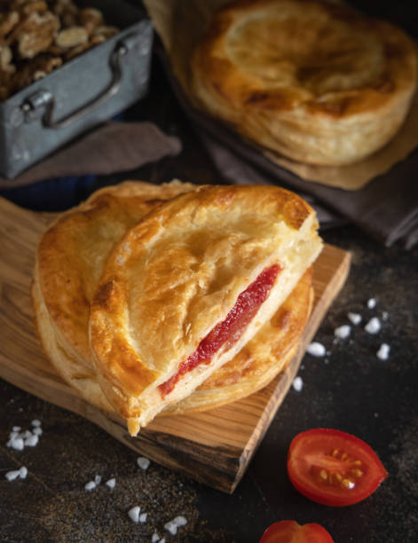istock Rustico puff pastry from Lecce filled with stuffed with tomato, mozzarella and bechamel sauce 1781501976