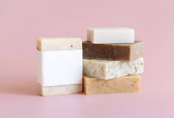 istock Beige and brown soap bars on light pink close up, soap packaging mockup 1781502182