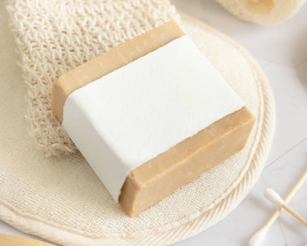 istock Beige handmade soap bar with blank label close up, packaging mockup 1781502487