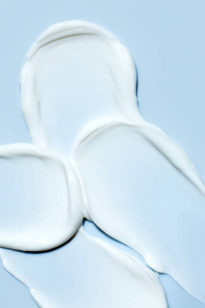 istock cosmetic smears cream texture on pastel blue background 1781504142