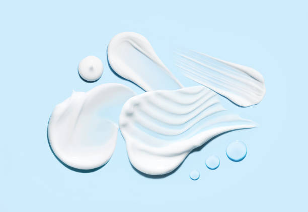 istock cosmetic smears cream texture on pastel blue background 1781504720
