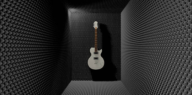 akustische schaum zimmer mit an der wand montierten electric guitar - domestic room audio stock-fotos und bilder