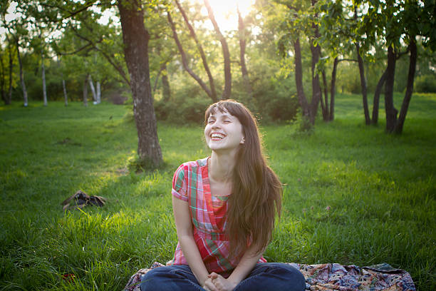 istock Girl smiles in a park 178151415