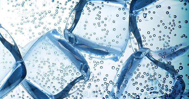 Ice cubes Bubbles with ice cubes carbonated water photos stock pictures, royalty-free photos & images