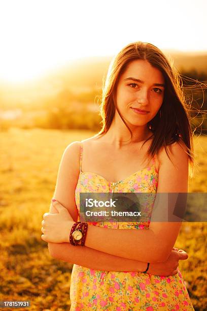 Portrait Of Teenage Girl With Sunset Stock Photo - Download Image Now - Adult, Adults Only, Beautiful People