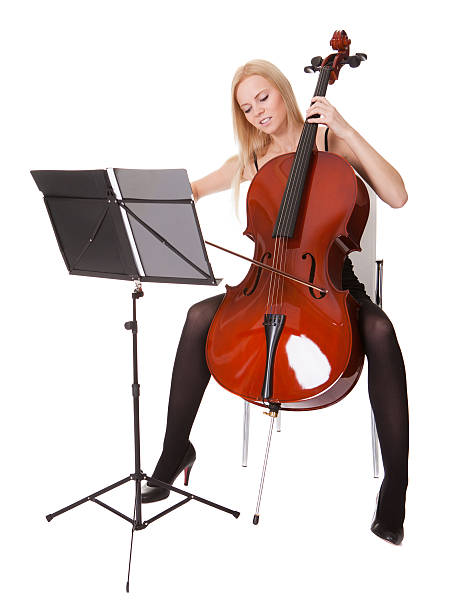 istock Beautiful young woman playing cello 178152078