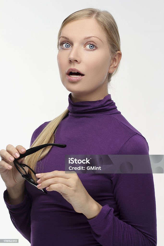 Retrato de mujer joven sorprendido de anteojos - Foto de stock de 20-24 años libre de derechos