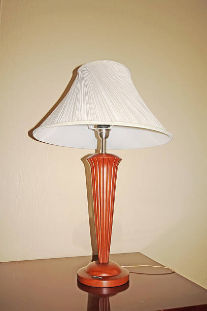 istock closeup of desk lamp 178152526