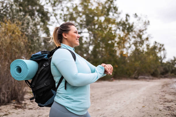 istock Young Woman Keeping Pace with her Smart Watch 1781549325