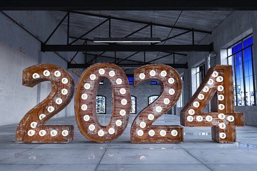 2024 Light Bulb Sign in Empty Warehouse. 2024 New Year Concept