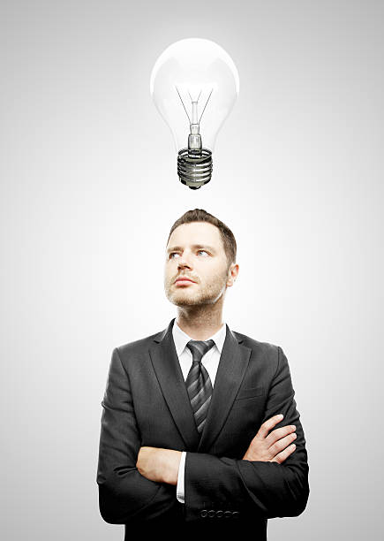 istock businessman and lamp 178158251