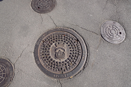 Exterior of the traditional decorated sewer manhole in Bergen, Norway.