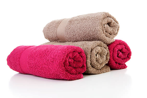 istock Four rolled colorful towels in red and brown 178159822