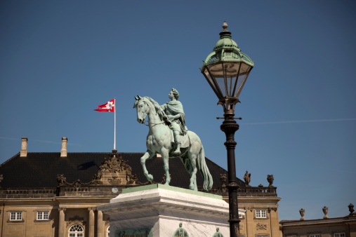Equestrian statue of king Frederik V (1723 - 1766) in Amalienborg Square. The statue was made by the famous french born sculptor Jacques-François-Joseph Saly. It took 14 years to make the status, so it was inaugurated, five years after the king died, in 1771.