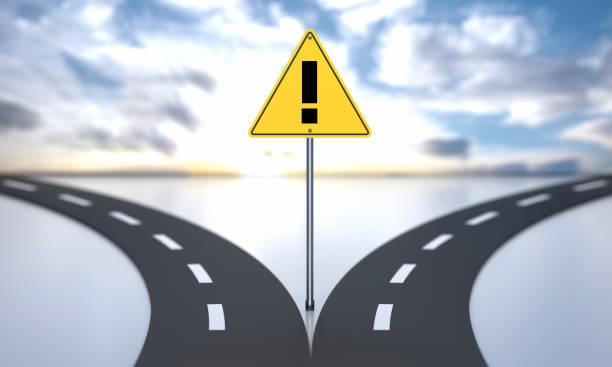 istock Exclamation mark. Divided Road And Decisions With Road Sign 1781609637
