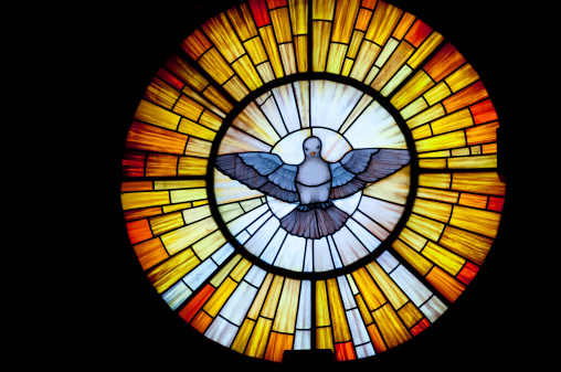 Stained glass picture of Outpouring of the Holy Spirit.