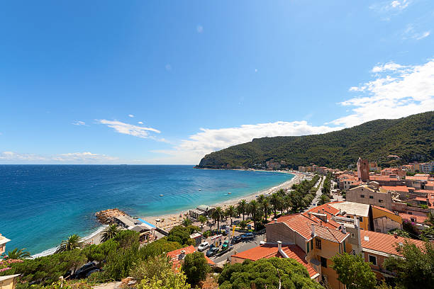 Lookout of Noli, a Medieval town on ligurian coasts "Noli, in a very sunny day, its towers and a very blue sea" madieval stock pictures, royalty-free photos & images