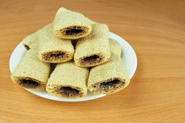 istock Cereal biscuits with chocolate filling in plate 1781619511