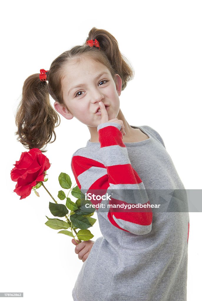 mothers day gift young child with flower gift for mothers day or valentines Child Stock Photo