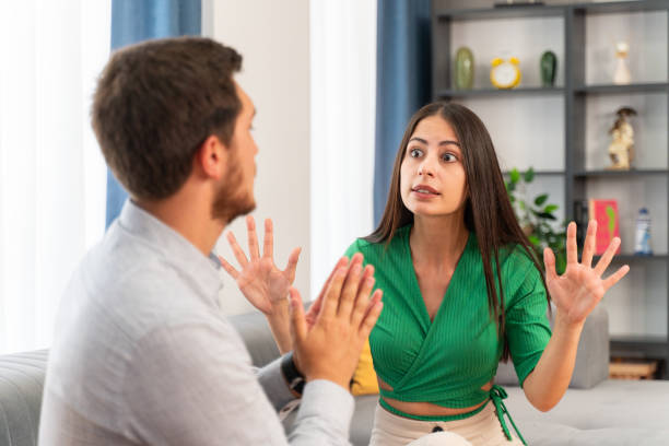 istock Young man defending himself to his angry girlfriend 1781630603