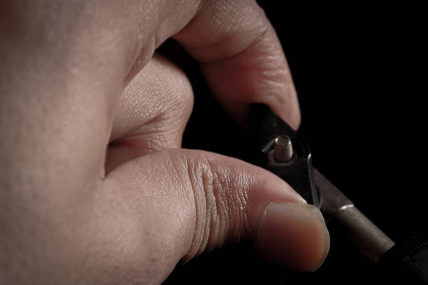 istock The figure of a hand turning a knob bolt 1781639332