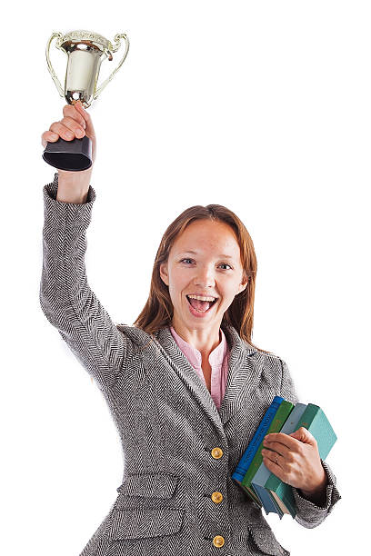 Happy girl holding cup and a book