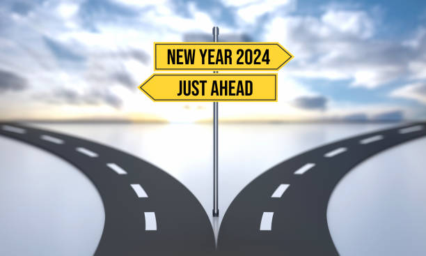 istock 2024 Ahead. Divided Road And Decisions With Road Sign 1781658180