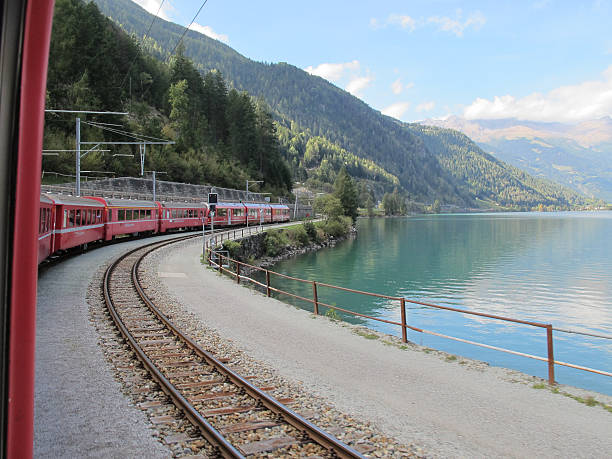 istock red train around the beautiful Swiss mountains 10 178166225