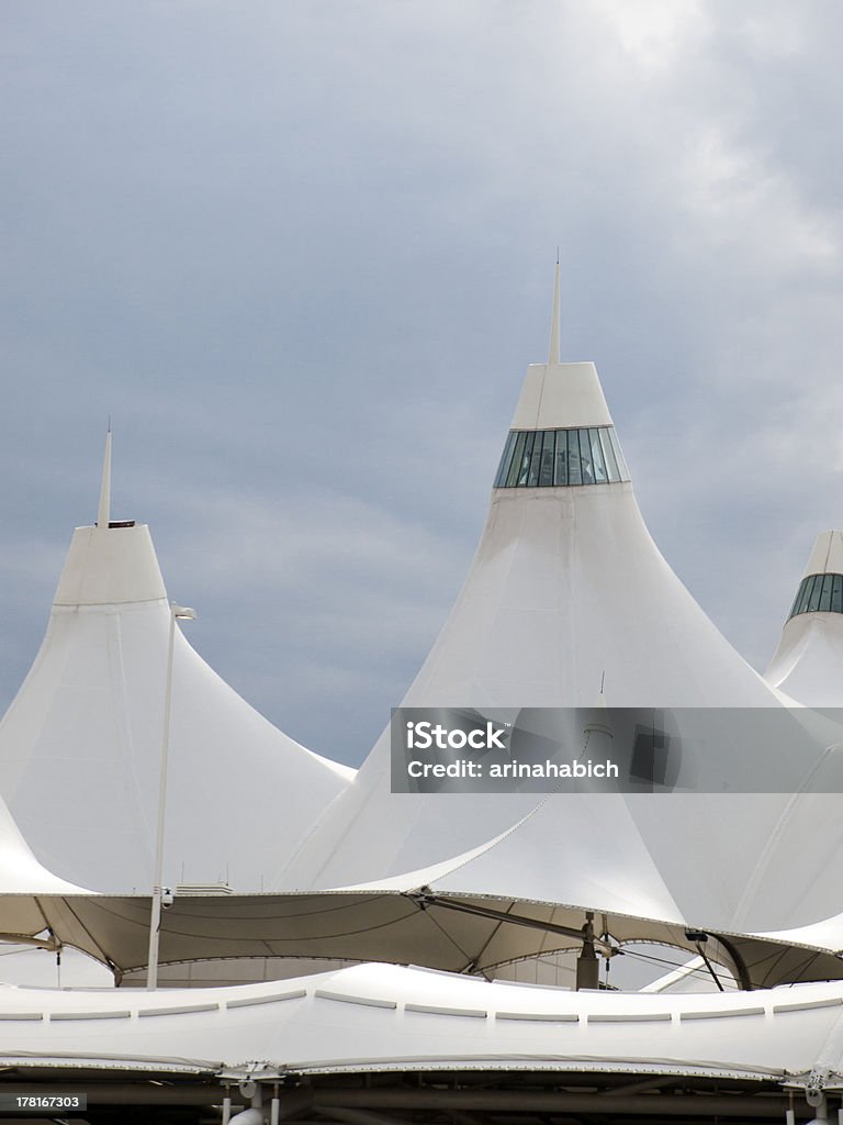 Denver International Airport Denver International Airport well known for peaked roof. Design of roof is reflecting snow-capped mountains. Denver International Airport Stock Photo