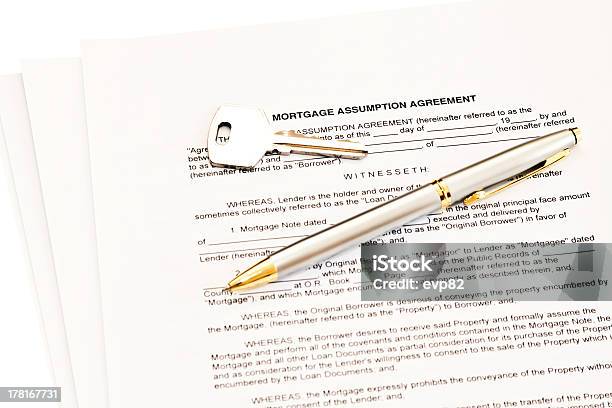 Mortgage Assumption Agreement With Pen For Signature And A Key Stock Photo - Download Image Now