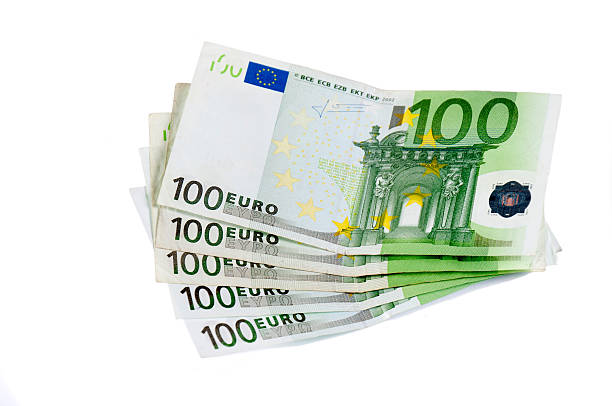 One hundred euro One hundred bills isolated on white background euro symbol stock pictures, royalty-free photos & images