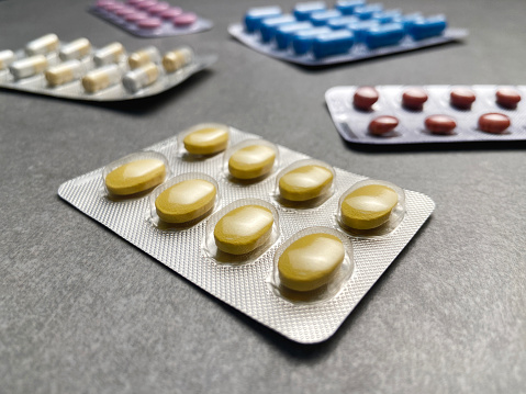 Different medication prepared for people affected by Covid-19, Azithromycin is a selective antiviral prophylactic against virus that is already in experimental use, conceptual image