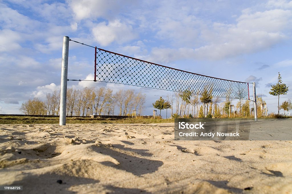 volleyball field 3rd Look at an empty beach volleyball court in the summer in low-angle shot Beige Stock Photo