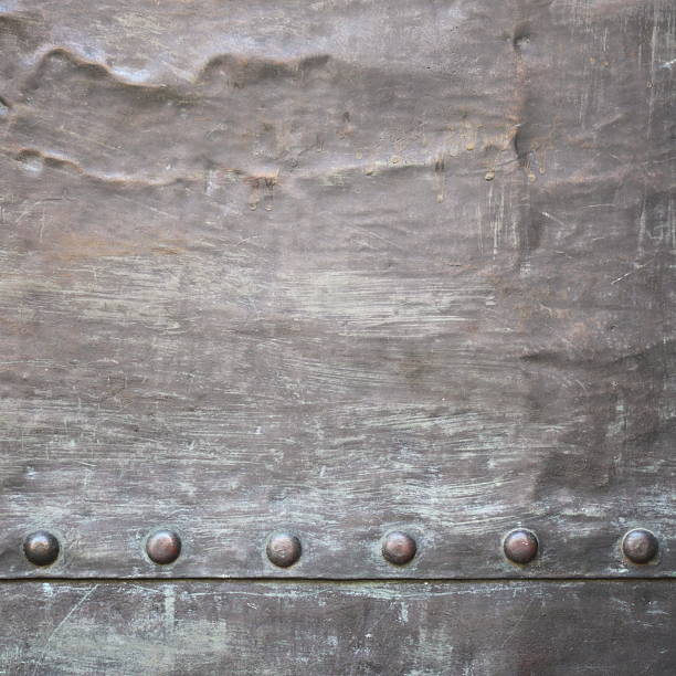 istock Black metal plate or armour texture with rivets 178170394