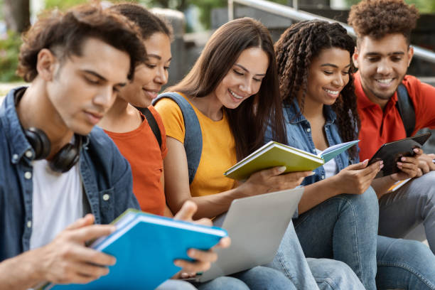 istock Group Of Young Multiethnic People Study Together Outdoors 1781711757