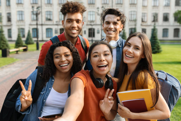istock Happy Multiethnic Group Of Students Making Selfie Outdoors Together 1781712909