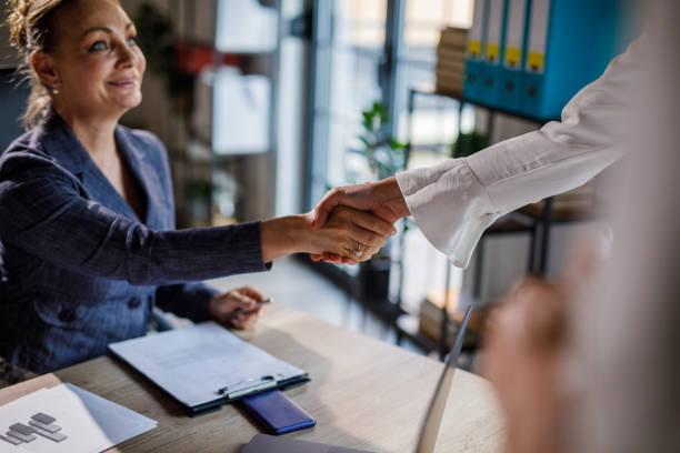 istock Businesswomen agreeing to partnership and shaking hands 1781743793