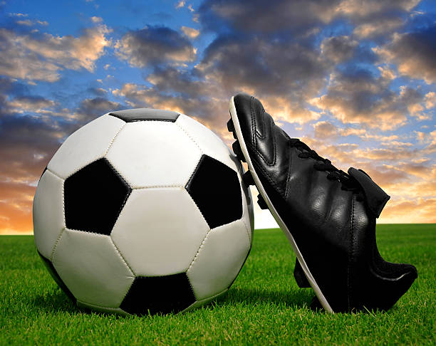 istock soccer ball and shoes 178175587