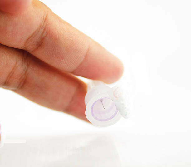 istock disposable needles for insulin pen on hand 178176118