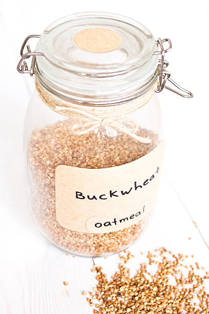 istock Glass Jars with Cereals on wooden background 178177131