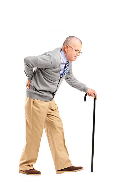 istock Senior gentleman walking and suffering from back pain 178178042